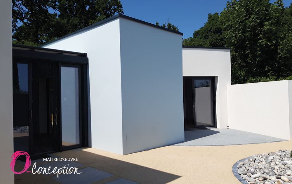 Agrandissement d'une maison avec 2 chambres et de grandes baies vitrées à LA ROCHE SUR YON.